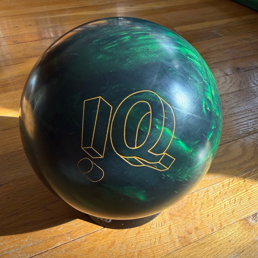 Storm IQ Bowling Ball Green two hands.
